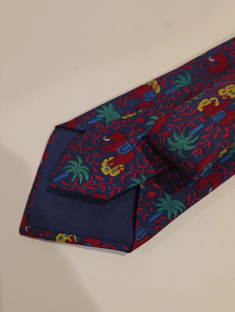 Hermes Silk Men's Patterned Red Silk Tie with Elephant & Palm Motif